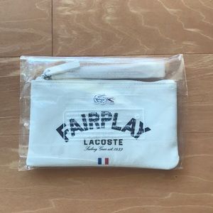 White Lacoste clutch